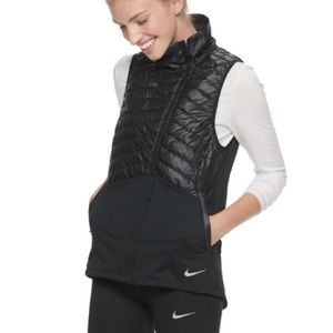 Women's Nike Essential Running Vest. Black. medium